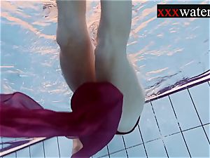 Smoking scorching Russian red-haired in the pool